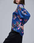 Sudadera de dragones azules