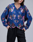 Sudadera de dragones azules